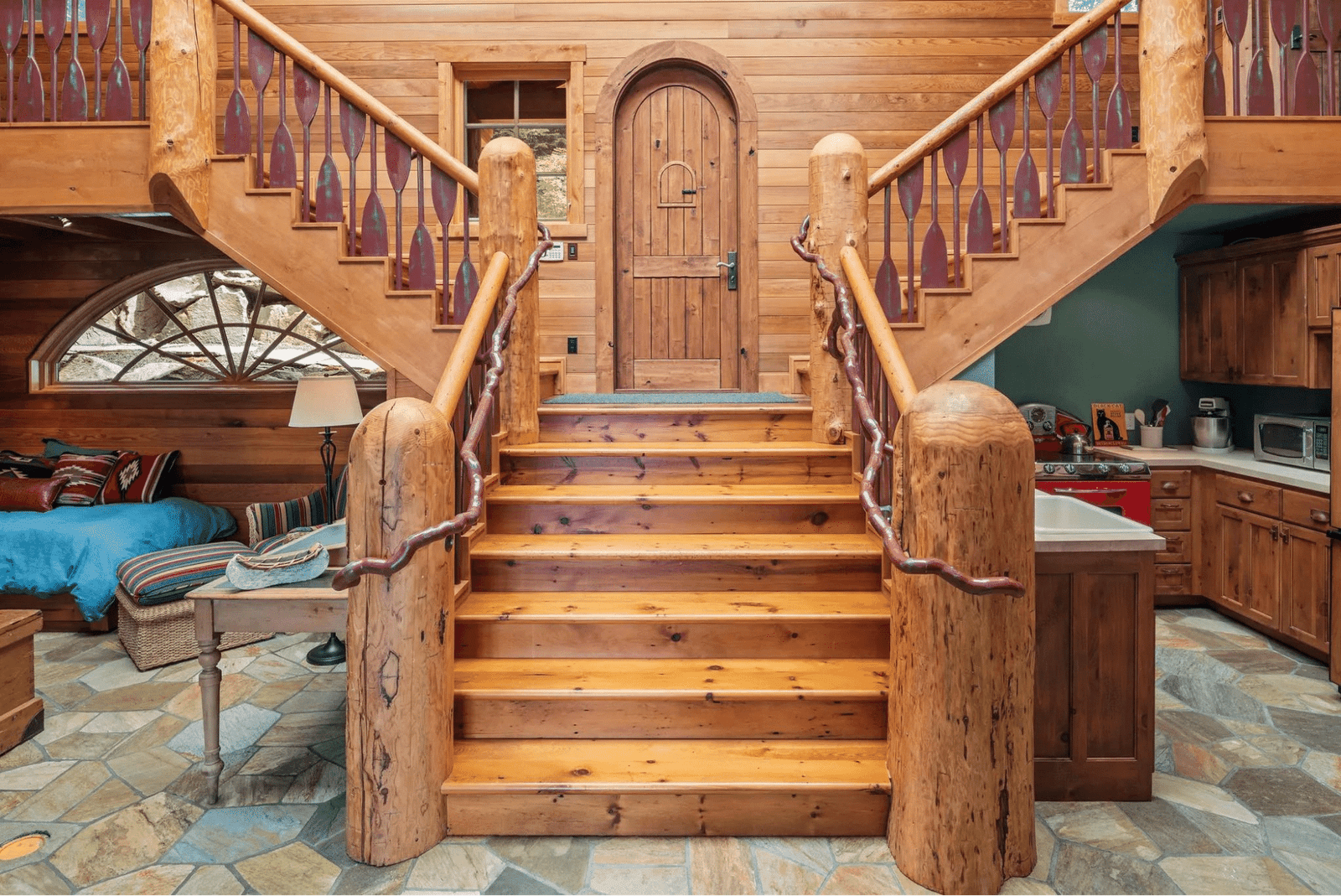 Guest lodge stairway, entrance, and kitchen